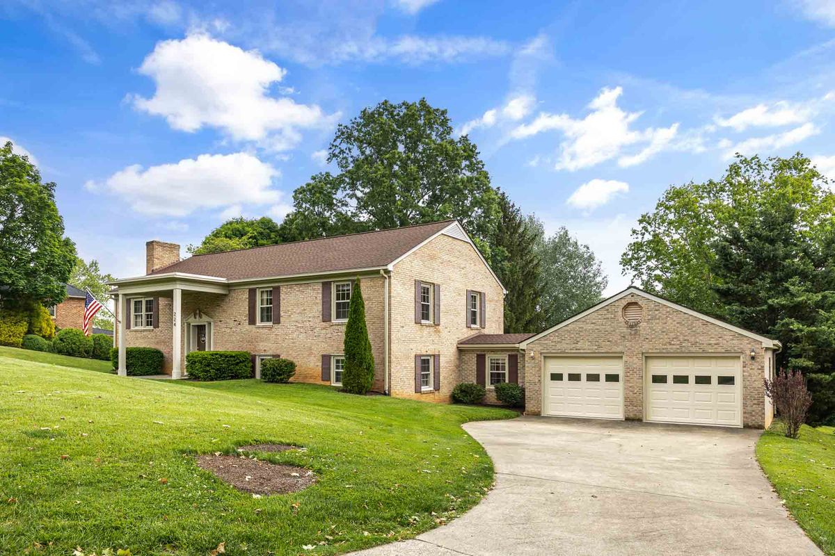 Exterior photography  -  brick colonial with American flag, Waynesboro VA